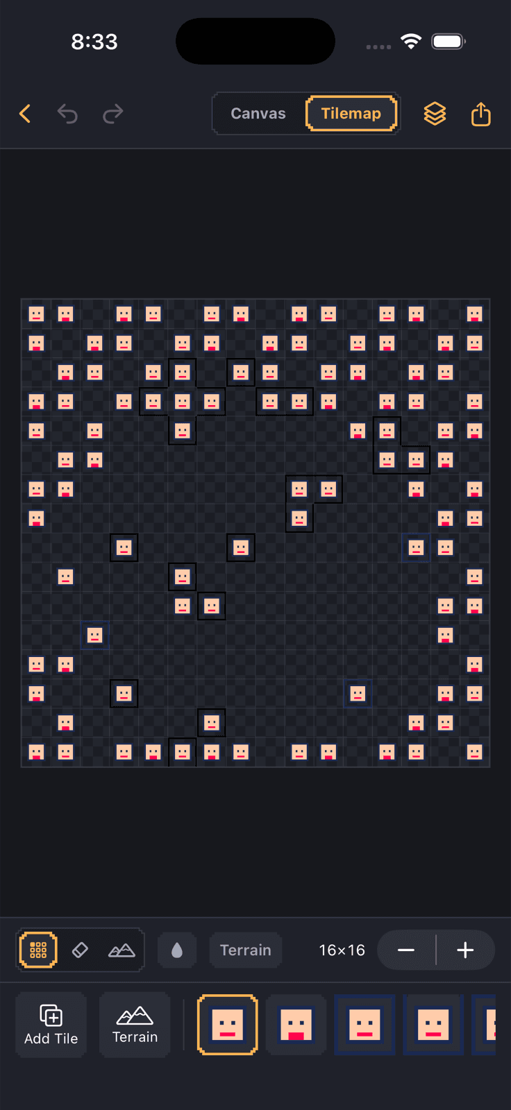 Terrain Brush autotiling a tilemap: a painted region whose edge and corner tiles were chosen automatically